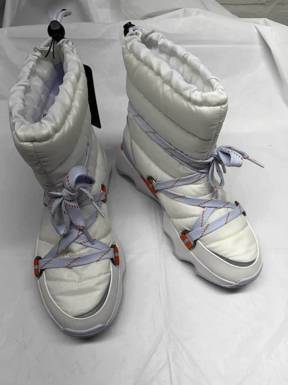 Sorel Women's White Winter Puffer Boots with Light Blue Laces and Orange Accents
